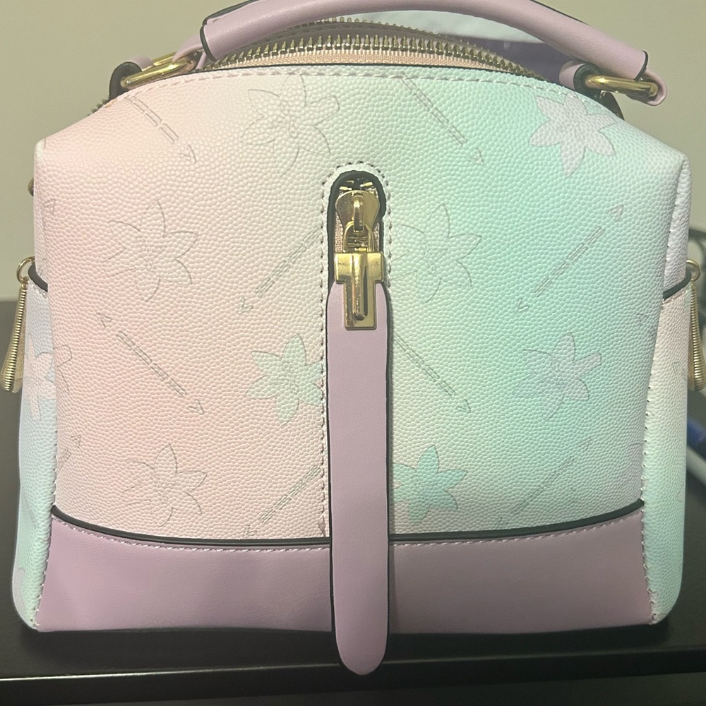 Multicolor mini bag. I’ve only used this bag twice.